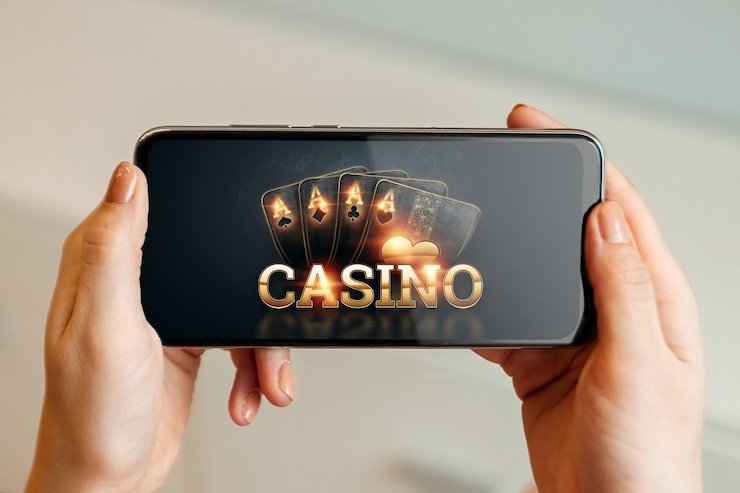 kingdomtoto.com mobile app interface showing live football and casino games